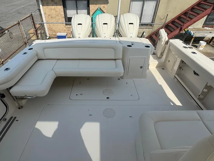  Yacht Photos Pics 2025 Grady-White Freedom 375 boat interior with white seating and spacious deck.