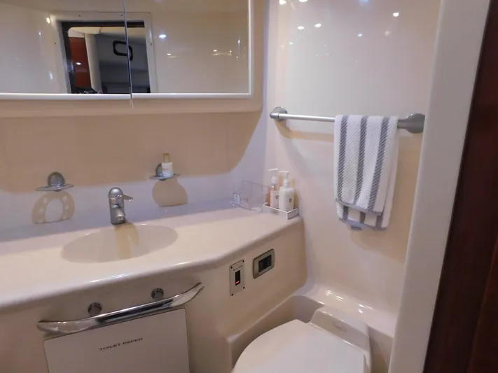  Yacht Photos Pics Luxurious bathroom in 2004 Sea Ray 600 Sun Sport yacht with modern amenities.