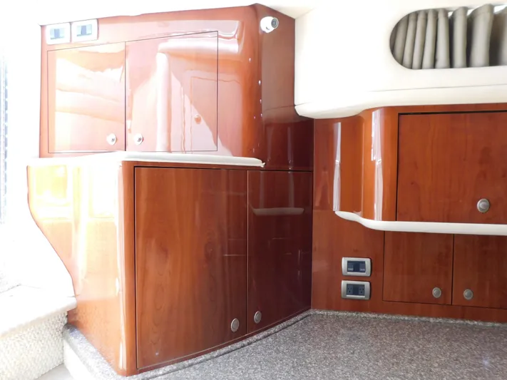  Yacht Photos Pics Luxurious wooden cabinetry inside a 2004 Sea Ray 600 Sun Sport yacht.
