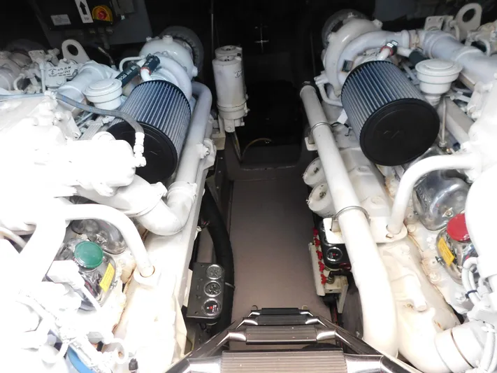  Yacht Photos Pics Engine room of a 2004 Sea Ray 600 Sun Sport yacht, showcasing dual engines.