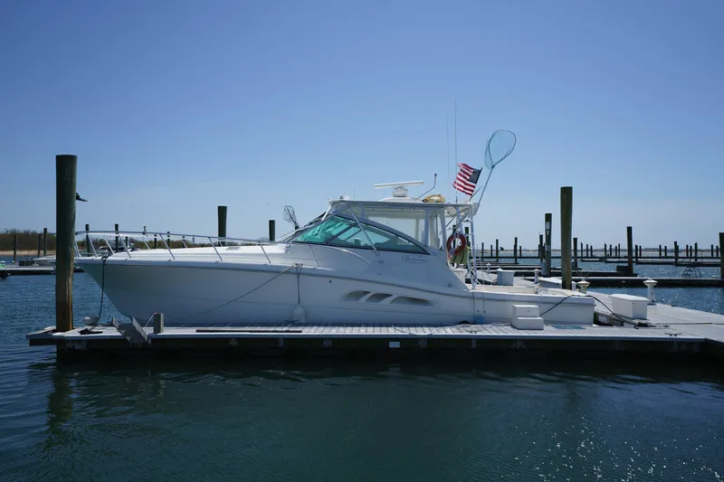 Hi Ho Silver Yacht Photos Pics 2011 Rampage 41 Express yacht docked at marina under clear blue sky.