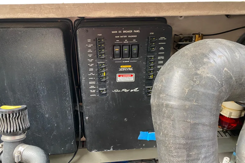 Wild Card Yacht Photos Pics Electrical panel of a 2004 Sea Ray 380 Sundancer boat engine room.