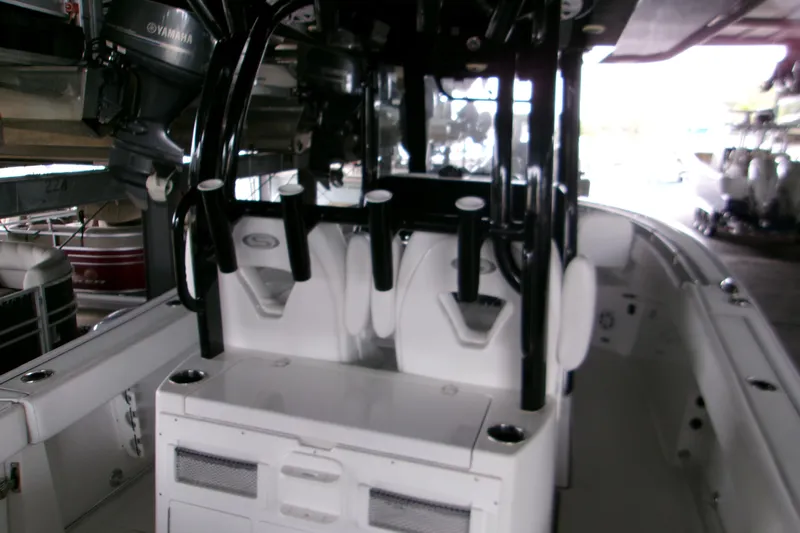  Yacht Photos Pics 2023 Sportsman Open 282 Center Console boat interior with seating and storage.