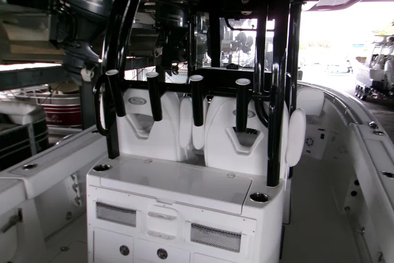  Yacht Photos Pics 2023 Sportsman Open 282 Center Console boat interior with seating and storage.