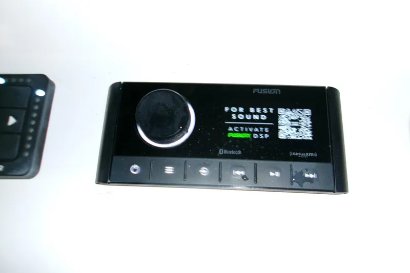  Yacht Photos Pics Control panel of 2023 Sportsman Open 282 Center Console with Fusion audio system.