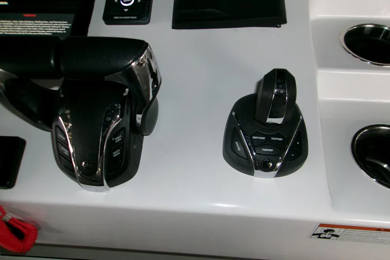  Yacht Photos Pics 2023 Sportsman Open 282 Center Console controls with joystick and throttle levers.