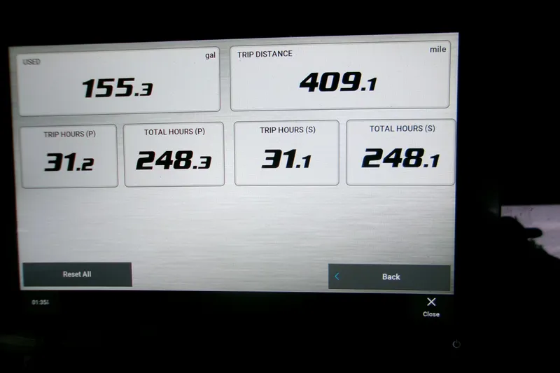  Yacht Photos Pics 2023 Sportsman Open 282 Center Console dashboard showing fuel usage and trip data.