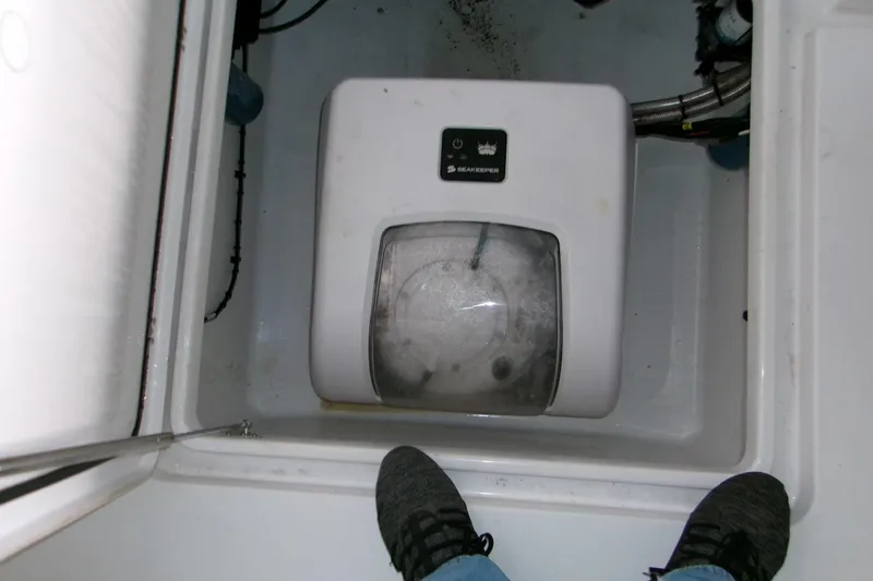  Yacht Photos Pics 2023 Sportsman Open 282 Center Console with Seakeeper stabilizer in compartment.