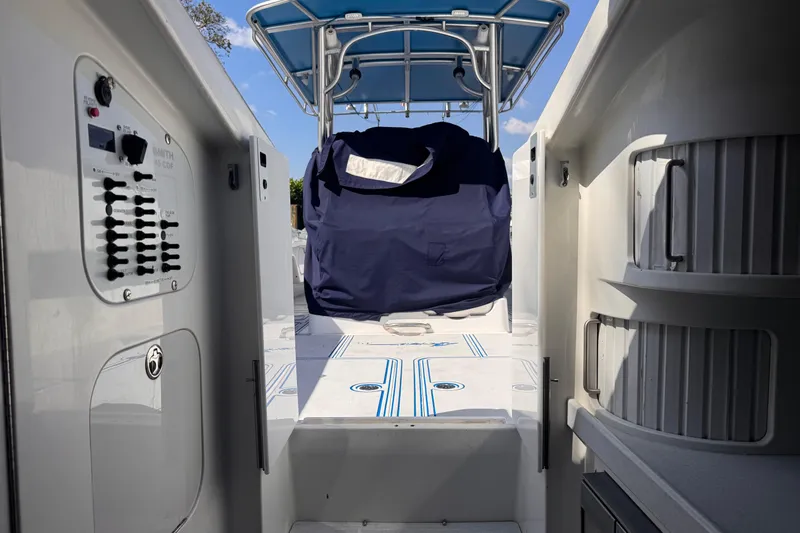  Yacht Photos Pics 2004 Don Smith 45 Custom boat interior with control panel and covered seating area.