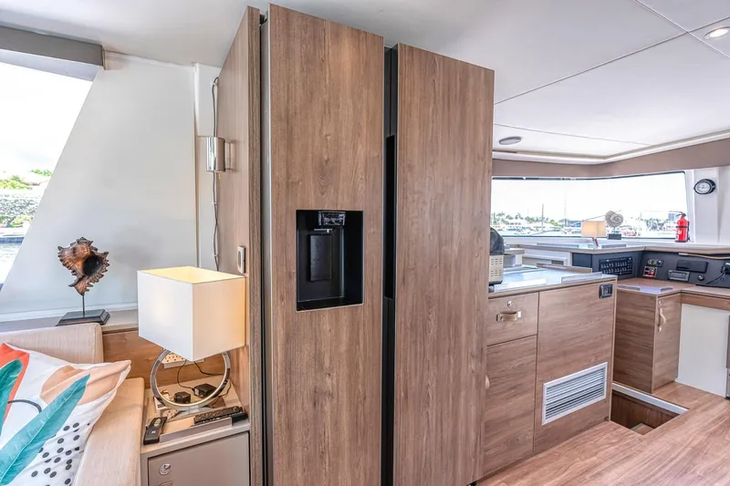 Dreamboat Annie Yacht Photos Pics Modern interior of 2022 Bali 4.8 yacht with wood finishes and stylish decor.