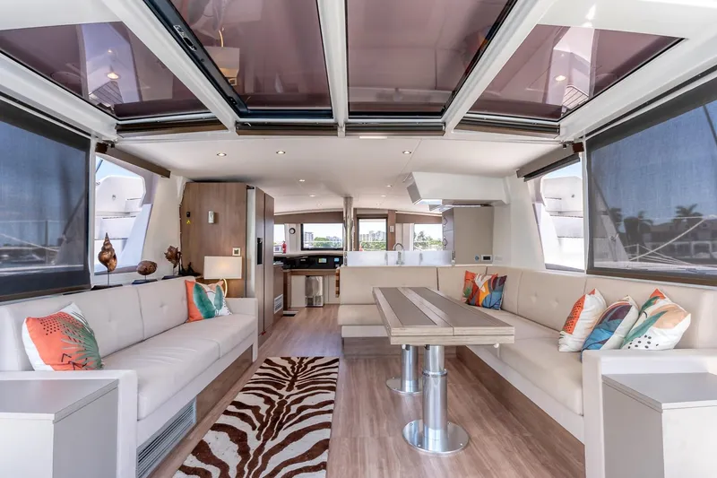 Dreamboat Annie Yacht Photos Pics Luxurious interior of 2022 Bali 4.8 yacht with modern seating and decor.