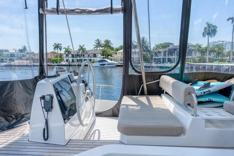 Dreamboat Annie Yacht Photos Pics Interior view of a 2022 Bali 4.8 yacht with waterfront scenery.