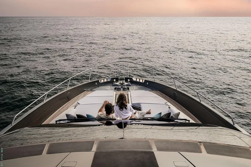  Yacht Photos Pics Manufacturer Provided Image: Luxury Riva 82' Diva yacht cruising at sunset, 2026 model.