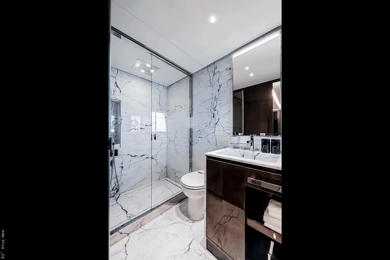  Yacht Photos Pics Manufacturer Provided Image: Luxurious bathroom in 2026 Riva 82' Diva yacht with marble finishes and modern fixtures.