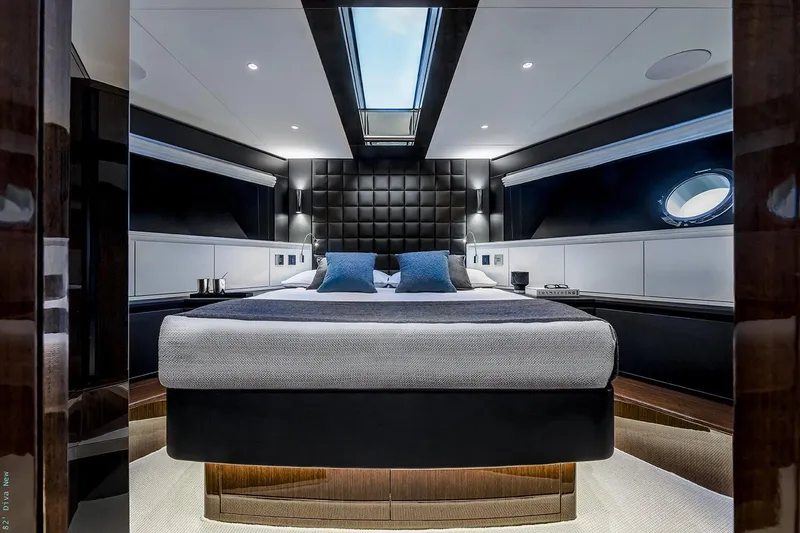  Yacht Photos Pics Manufacturer Provided Image: Luxurious bedroom interior of 2026 Riva 82' Diva yacht with modern design and skylight.