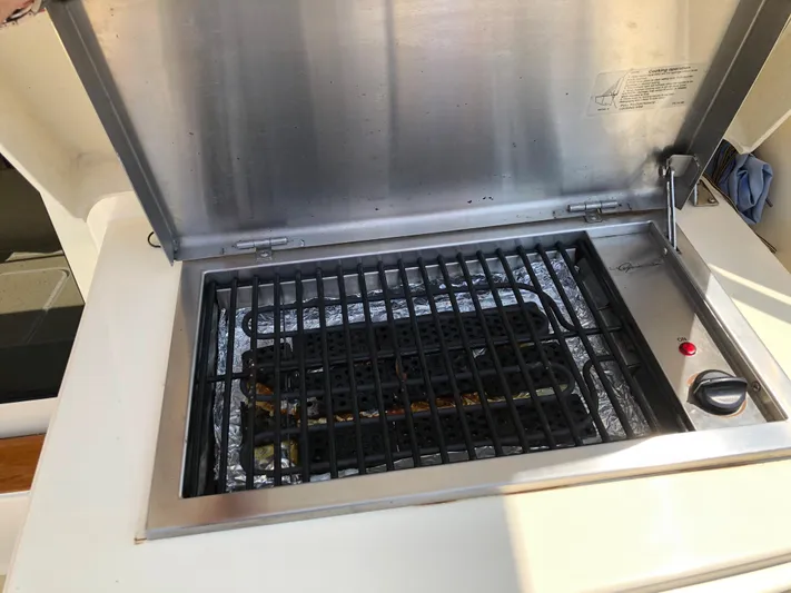  Yacht Photos Pics Built-in grill on 2009 Sabre 40 Sedan yacht, open lid, stainless steel design.