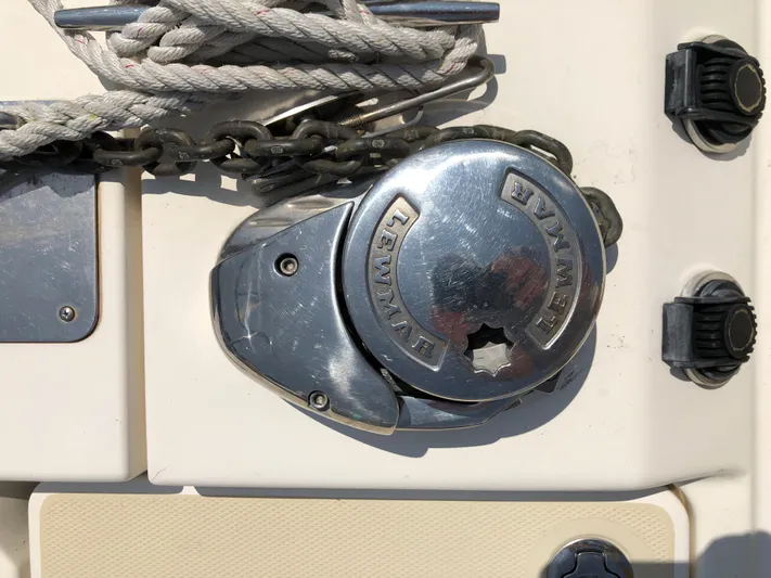  Yacht Photos Pics Anchor winch on 2009 Sabre 40 Sedan boat deck with ropes and chains.