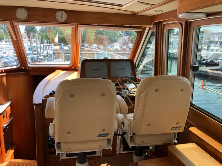  Yacht Photos Pics Interior of 2009 Sabre 40 Sedan yacht with dual helm seats and navigation equipment.