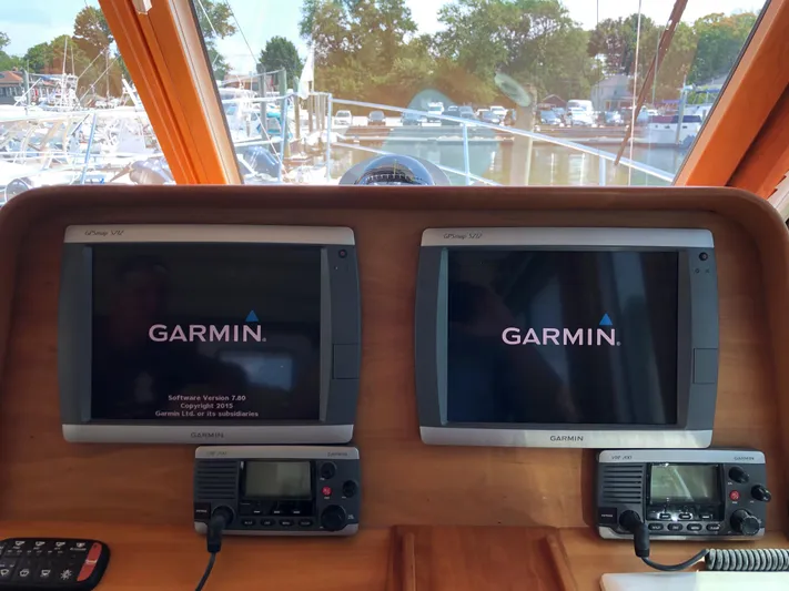  Yacht Photos Pics 2009 Sabre 40 Sedan helm with dual Garmin navigation displays and communication devices.