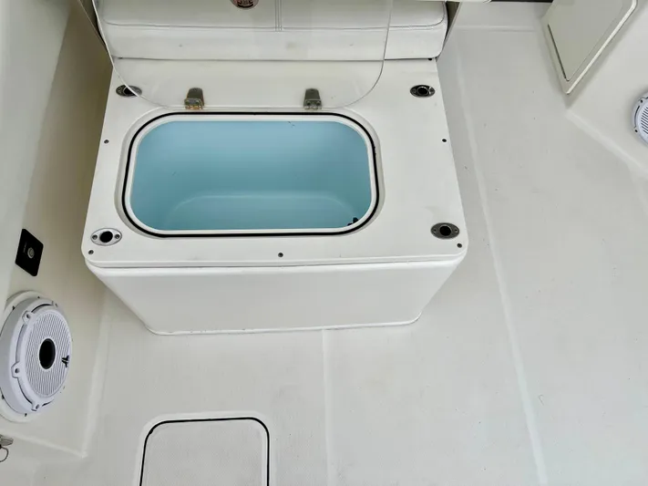  Yacht Photos Pics 2021 World Cat 280 DC-X boat deck with open storage compartment.