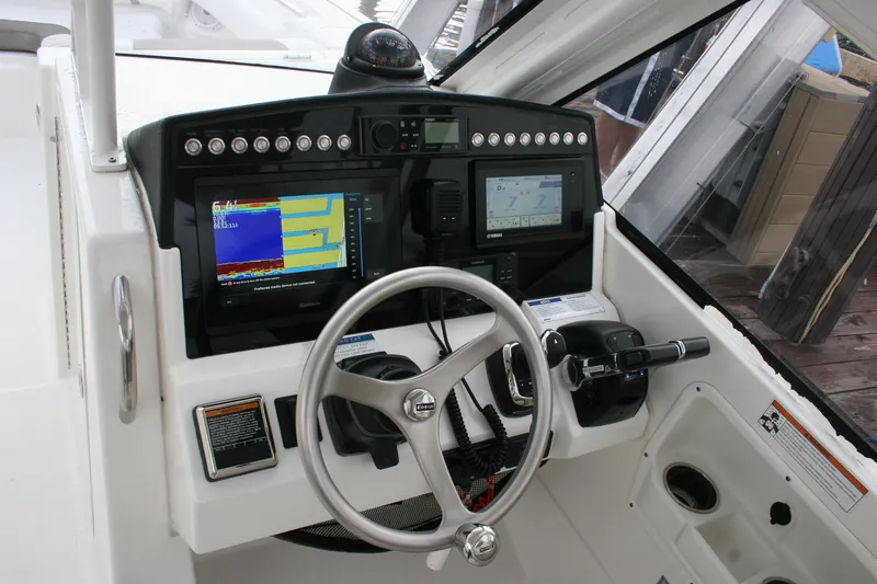  Yacht Photos Pics 2021 World Cat 280 DC-X helm with advanced navigation and control systems.