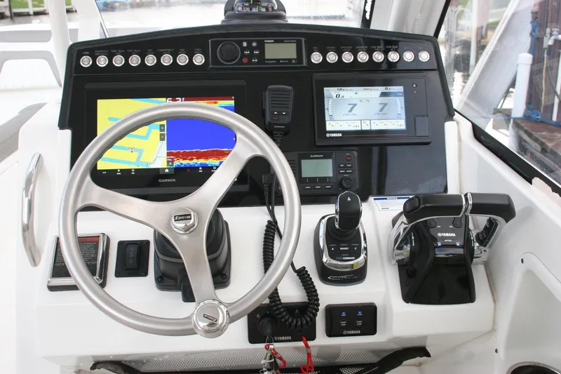  Yacht Photos Pics Cockpit of 2021 World Cat 280 DC-X with advanced navigation and control systems.