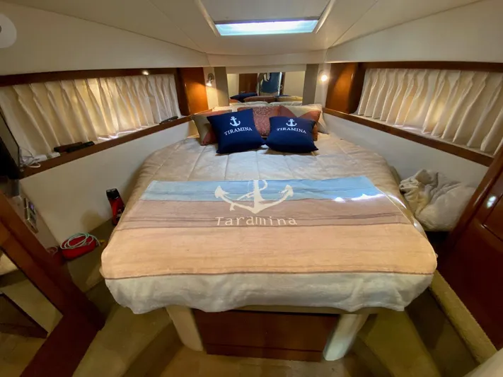 Taramina Yacht Photos Pics Luxurious cabin interior of 2008 Sea Ray 38 Sundancer with cozy bedding and nautical decor.