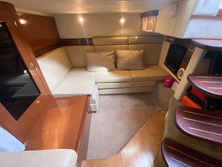 Taramina Yacht Photos Pics Interior of 2008 Sea Ray 38 Sundancer yacht with cozy seating and modern design.