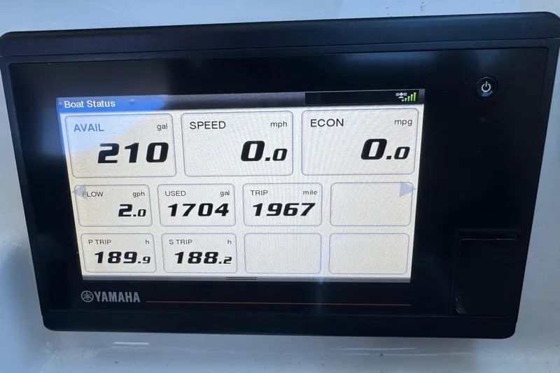 In Pursuit Yacht Photos Pics Yamaha boat display showing fuel status and trip data on Pursuit DC 325 Dual Console.