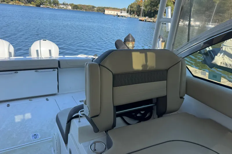 In Pursuit Yacht Photos Pics 2019 Pursuit DC 325 Dual Console boat interior with lake view.