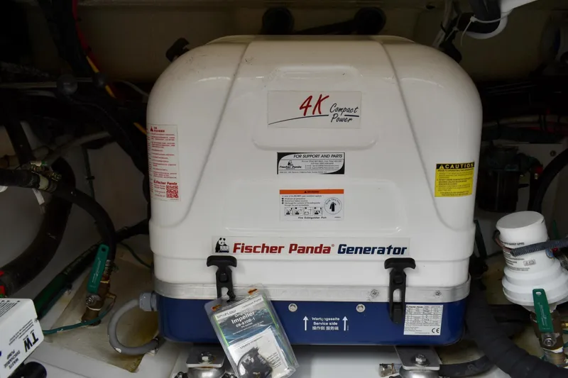 In Pursuit Yacht Photos Pics Fischer Panda generator in 2019 Pursuit DC 325 Dual Console boat engine room.