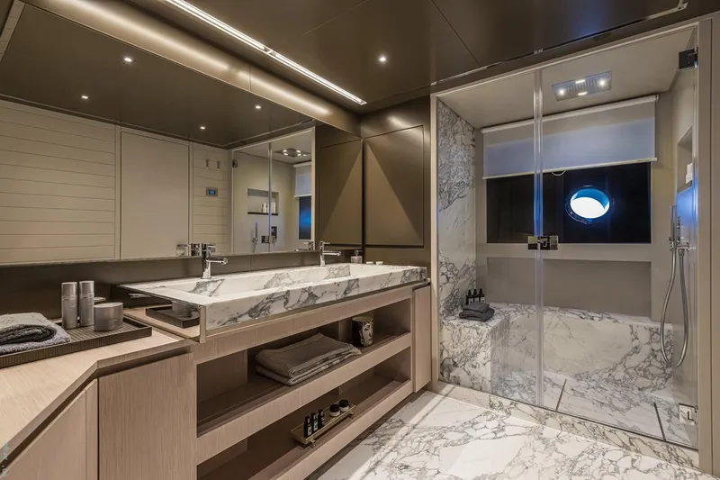 Riva Argo 90 Yacht Photos Pics Manufacturer Provided Image: Luxurious bathroom on 2026 Riva 90' Argo yacht with marble accents and modern fixtures.