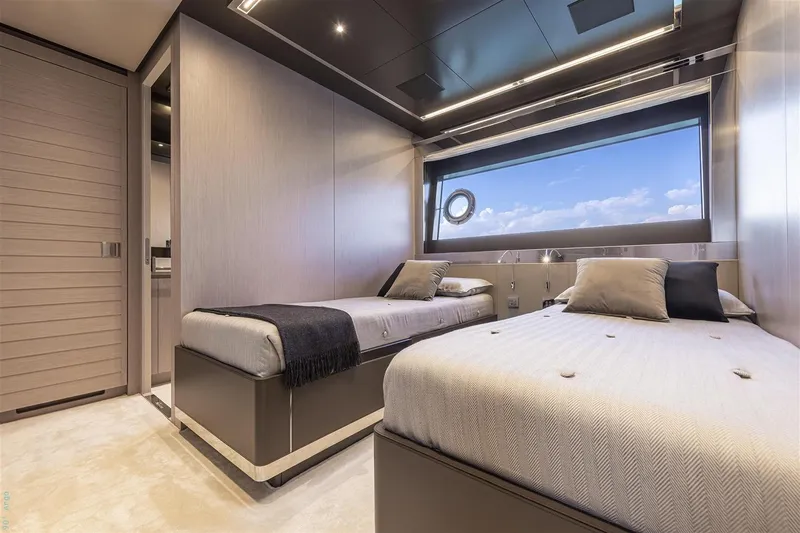 Riva Argo 90 Yacht Photos Pics Manufacturer Provided Image: Luxurious twin bedroom interior on 2026 Riva 90' Argo yacht with ocean view.