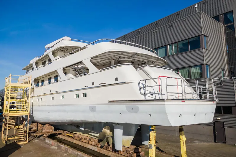 Valeria Yacht Photos Pics 1975 Feadship Motoryacht in dry dock, showcasing elegant design and craftsmanship.