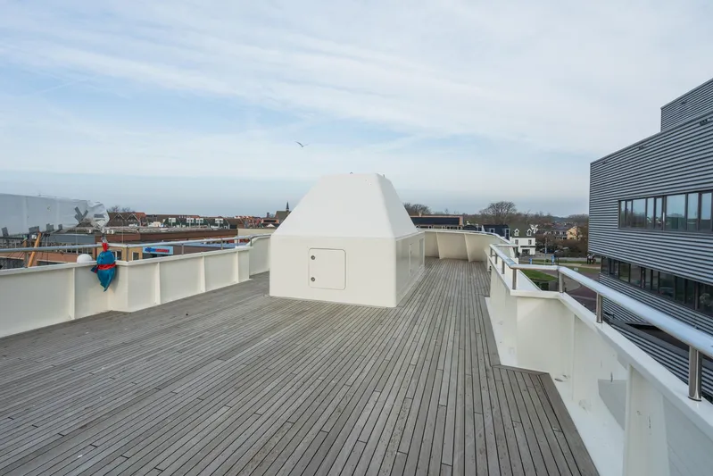 Valeria Yacht Photos Pics Spacious deck of 1975 Feadship motoryacht with wooden flooring and modern design.