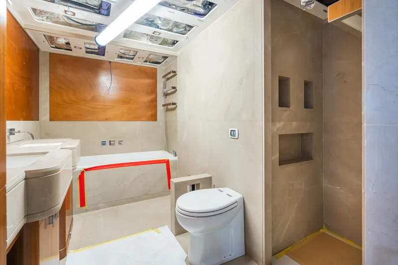 Valeria Yacht Photos Pics Luxurious bathroom on a 1975 Feadship motoryacht, featuring modern fixtures and elegant design.