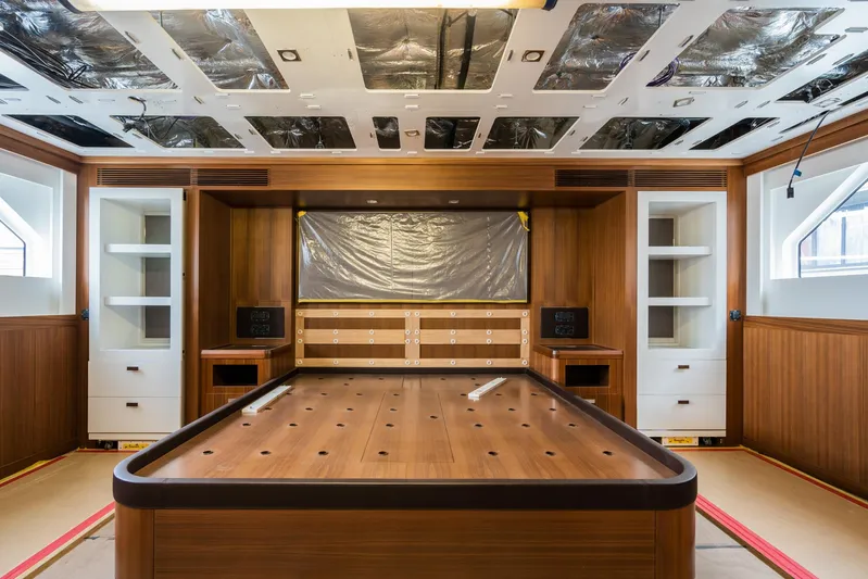 Valeria Yacht Photos Pics 1975 Feadship Motoryacht interior with wooden cabinetry and ceiling under renovation.