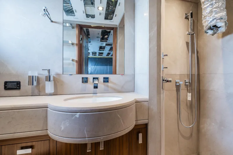 Valeria Yacht Photos Pics Luxurious bathroom interior on a 1975 Feadship motoryacht, featuring modern fixtures and elegant design.