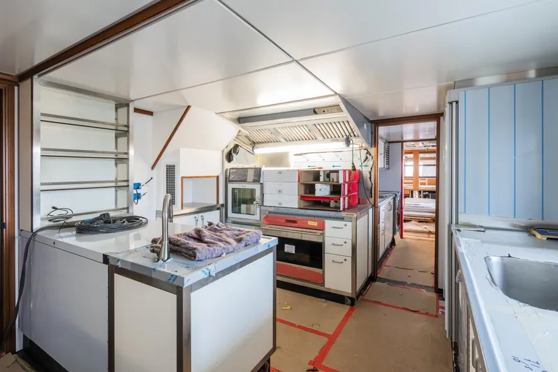 Valeria Yacht Photos Pics 1975 Feadship Motoryacht kitchen interior with modern appliances and sleek design.