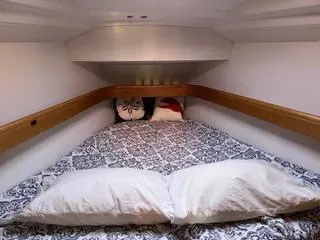 Beckon Yacht Photos Pics Cozy cabin interior of 2010 Jeanneau Sun Odyssey 39i Performance sailboat.