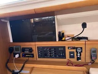 Beckon Yacht Photos Pics Control panel of 2010 Jeanneau Sun Odyssey 39i Performance yacht interior.
