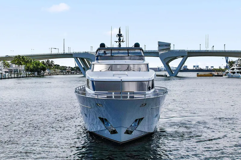 Notorious Yacht Photos Pics Front view of 2017 Sanlorenzo SL106 yacht cruising under a bridge.