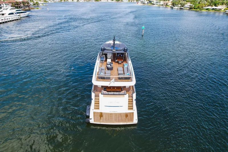 Notorious Yacht Photos Pics Sanlorenzo SL106 yacht cruising on a serene waterway, 2017 model.