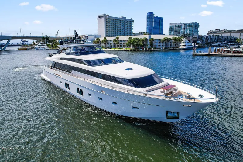 Notorious Yacht Photos Pics Luxurious 2017 Sanlorenzo SL106 yacht cruising in a scenic marina setting.