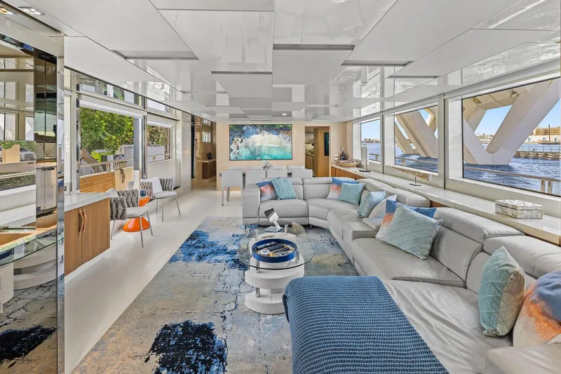 Notorious Yacht Photos Pics Luxurious interior of 2017 Sanlorenzo SL106 yacht with modern decor and panoramic windows.