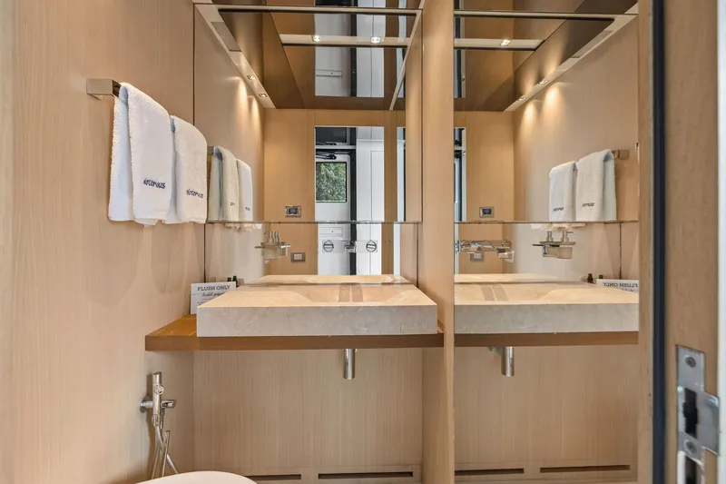 Notorious Yacht Photos Pics Luxurious bathroom on 2017 Sanlorenzo SL106 yacht with modern fixtures and elegant design.