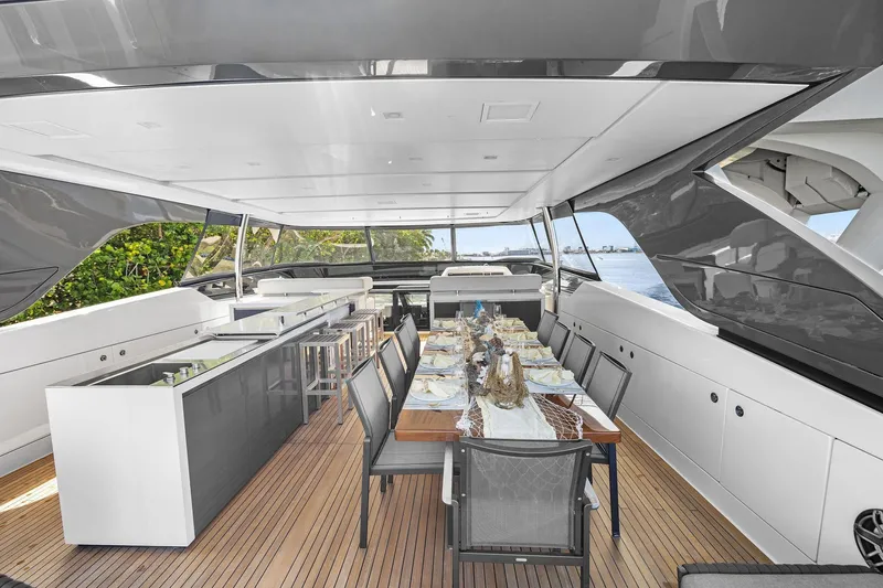 Notorious Yacht Photos Pics Luxurious 2017 Sanlorenzo SL106 yacht with elegant dining area and modern bar setup.