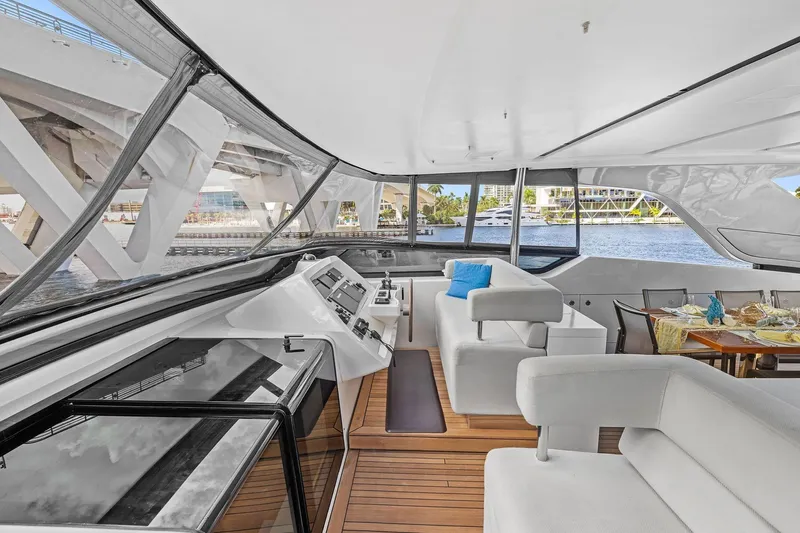 Notorious Yacht Photos Pics Luxurious interior of 2017 Sanlorenzo SL106 yacht with elegant seating and dining area.