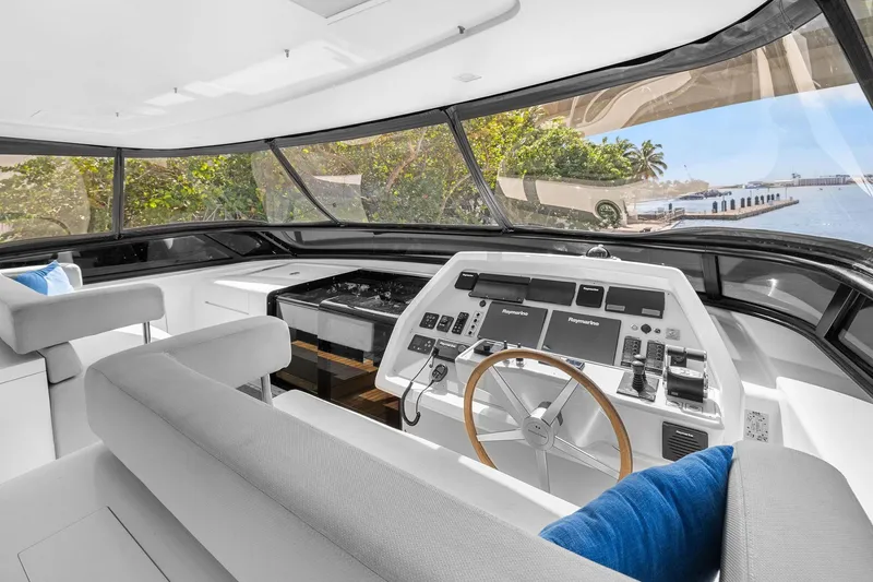 Notorious Yacht Photos Pics Luxurious 2017 Sanlorenzo SL106 yacht helm with modern controls and panoramic views.