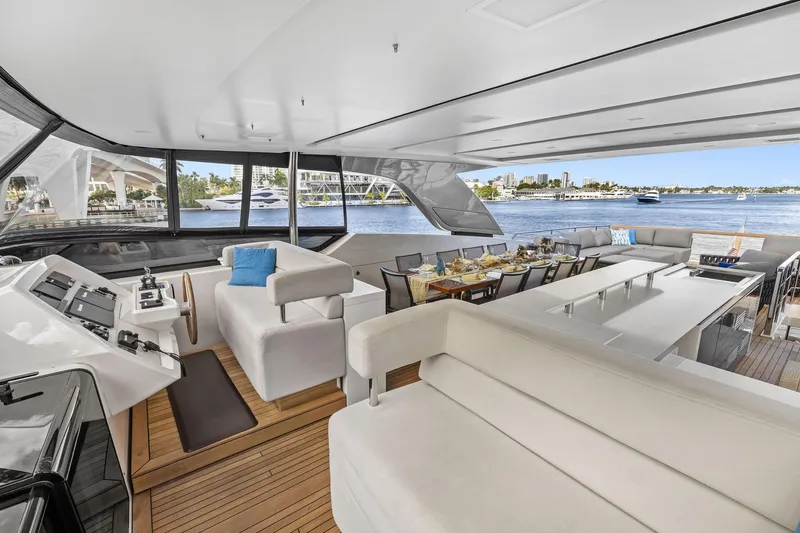 Notorious Yacht Photos Pics Luxurious 2017 Sanlorenzo SL106 yacht interior with elegant dining area and scenic waterfront view.